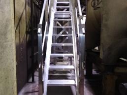 caduta da macchinario