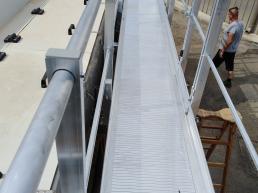 caduta da macchinario