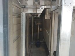 caduta da macchinario